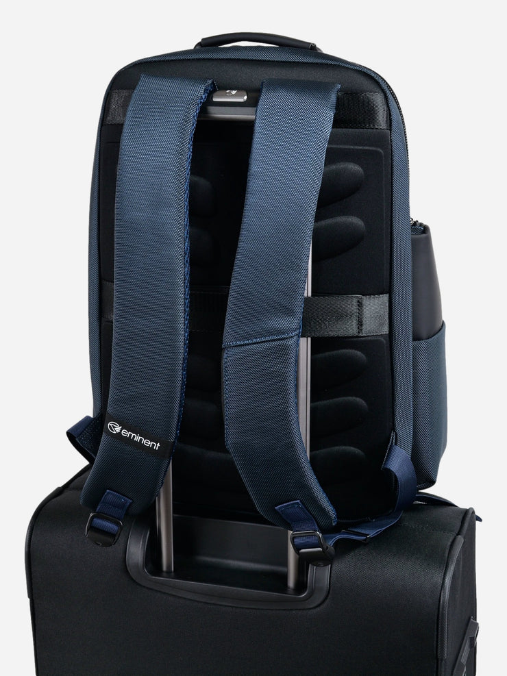 Eminent Travel Guard Laptop Backpack Blue fixed on top of suitcase