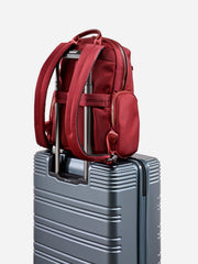 Eminent Litepak Backpack Red fixed on top of suitcase